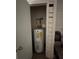 Water heater in a small closet at 3709 Charlotte Dr, Rex, GA 30273