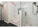 Modern bathroom with tiled walls, soaking tub and glass-enclosed shower stall at 4615 Thermal Ct, Douglasville, GA 30135