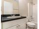 Standard bathroom featuring a single sink, vanity, toilet, and shower/tub combo at 4615 Thermal Ct, Douglasville, GA 30135