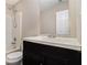 Bathroom featuring a toilet, shower with a white shower surround and a vanity at 4615 Thermal Ct, Douglasville, GA 30135