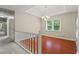 Formal dining room boasts a tray ceiling and a modern chandelier at 670 Dena Dr, Canton, GA 30114