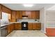 Traditional kitchen with ample counter space and cabinets and modern appliances at 670 Dena Dr, Canton, GA 30114
