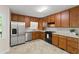 Traditional kitchen with stainless appliances, abundant cabinets and laminate countertops at 670 Dena Dr, Canton, GA 30114