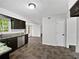 Clean kitchen features stainless steel appliances, granite countertops and dark cabinets at 8683 Twin Oaks Dr, Jonesboro, GA 30236