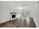Inviting living room with hardwood floors and a traditional fireplace at 8683 Twin Oaks Dr, Jonesboro, GA 30236