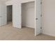 Bedroom with a closet and paneled doors at 1288 Hollingsworth Way, Dacula, GA 30019