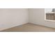 Cozy bedroom with a window featuring blinds and neutral colored carpet at 1288 Hollingsworth Way, Dacula, GA 30019
