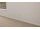 Bedroom showing the window with blinds, carpeted floors and white walls at 1288 Hollingsworth Way, Dacula, GA 30019