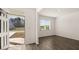 A bright living room featuring hardwood floors and a view of the front yard at 1288 Hollingsworth Way, Dacula, GA 30019