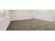 Large living room with hardwood floors, white trim, and a bright window at 1288 Hollingsworth Way, Dacula, GA 30019
