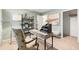 A quiet study area featuring a decorative desk, comfortable chair, and a well organized bookshelf at 1288 Hollingsworth Way, Dacula, GA 30019
