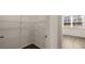 Spacious walk-in closet with ample shelving and storage space at 1288 Hollingsworth Way, Dacula, GA 30019