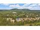 Aerial view of a lush neighborhood with trees and homes nestled in natural surroundings at 1294 Parkview Nw Ln, Kennesaw, GA 30152
