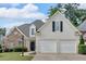 Charming two-story home with stone accents, manicured lawn, and a two-car garage at 1294 Parkview Nw Ln, Kennesaw, GA 30152