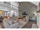 Spacious living room features a high ceiling, comfortable seating, and a fireplace at 1294 Parkview Nw Ln, Kennesaw, GA 30152