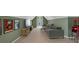 Spacious living room with comfortable seating, a large TV, and a vintage popcorn cart at 1294 Parkview Nw Ln, Kennesaw, GA 30152