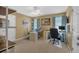 Home office featuring natural light, multiple desks, and neutral-colored walls at 1294 Parkview Nw Ln, Kennesaw, GA 30152