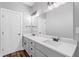 Bathroom features double sink vanity, quartz countertops and modern fixtures at 210 Joe Green Ln, Canton, GA 30114