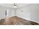 Spacious bedroom with wood look flooring and ensuite bathroom at 210 Joe Green Ln, Canton, GA 30114
