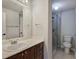Bathroom featuring a vanity, toilet, and tiled shower at 2110 River Green Nw Dr # 2110, Atlanta, GA 30327