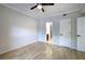 Bright bedroom with hardwood floors and a ceiling fan at 2110 River Green Nw Dr # 2110, Atlanta, GA 30327