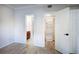 Bedroom with hardwood floors and access to ensuite bathroom and walk in closet at 2110 River Green Nw Dr # 2110, Atlanta, GA 30327