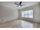 Bedroom featuring hardwood floors, a ceiling fan, and natural light from a window at 2110 River Green Nw Dr # 2110, Atlanta, GA 30327