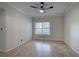 Bedroom with hardwood floors, a ceiling fan, and natural light at 2110 River Green Nw Dr # 2110, Atlanta, GA 30327