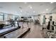 Well-equipped gym with treadmills, ellipticals, weights, and mirrors, promoting a healthy lifestyle at 2110 River Green Nw Dr # 2110, Atlanta, GA 30327
