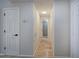 Hallway featuring access to bathroom and storage space at 2110 River Green Nw Dr # 2110, Atlanta, GA 30327