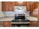 Kitchen with stainless steel oven and cooktop and light countertops at 2110 River Green Nw Dr # 2110, Atlanta, GA 30327