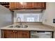 Open kitchen featuring a pass-through and stainless steel appliances at 2110 River Green Nw Dr # 2110, Atlanta, GA 30327
