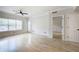 Bright living room with hardwood floors, neutral walls, and a view into another room at 2110 River Green Nw Dr # 2110, Atlanta, GA 30327