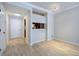 Bright living room with hardwood floors and an entryway view of the kitchen at 2110 River Green Nw Dr # 2110, Atlanta, GA 30327