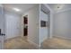 Hardwood floors and a view of the kitchen from the doorway in this living room at 2110 River Green Nw Dr # 2110, Atlanta, GA 30327