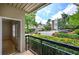 Balcony overlooking courtyard with manicured landscaping and common parking at 2110 River Green Nw Dr # 2110, Atlanta, GA 30327