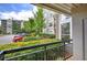 View from private patio looking out to lush landscaping and parking area at 2110 River Green Nw Dr # 2110, Atlanta, GA 30327