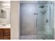 Modern shower with gray tile and glass doors at 2110 River Green Nw Dr # 2110, Atlanta, GA 30327