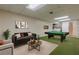 Finished basement featuring pool table, carpeting, living area and laundry area at 6825 Castleton Dr, Atlanta, GA 30328