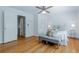 Bright primary bedroom with hardwood floors and an abundance of light from the window at 6825 Castleton Dr, Atlanta, GA 30328