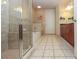 Modern bathroom featuring a glass shower and bathtub at 711 Cosmopolitan Ne Dr # 338, Atlanta, GA 30324