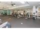 Well-equipped gym with treadmills, weight machines, and floor-to-ceiling windows, offering a bright workout space at 711 Cosmopolitan Ne Dr # 338, Atlanta, GA 30324