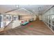 Bright hallway with bench seating and windows into the gym area at 711 Cosmopolitan Ne Dr # 338, Atlanta, GA 30324