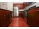 Well-lit kitchen with stainless steel appliances, granite countertops, and sleek wood flooring at 711 Cosmopolitan Ne Dr # 338, Atlanta, GA 30324