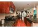 Modern kitchen features granite countertops, stainless steel appliances, and an open floor plan at 711 Cosmopolitan Ne Dr # 338, Atlanta, GA 30324