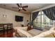 Comfortable living room featuring modern ceiling fan and balcony access at 711 Cosmopolitan Ne Dr # 338, Atlanta, GA 30324
