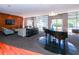 Spacious condo lobby area featuring comfortable seating, piano, and elegant decor at 711 Cosmopolitan Ne Dr # 338, Atlanta, GA 30324