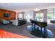 Expansive lobby with abundant natural light, modern decor, and a grand piano for community enjoyment at 711 Cosmopolitan Ne Dr # 338, Atlanta, GA 30324