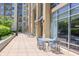 A community patio features tables and chairs for residents to enjoy outdoor socializing at 711 Cosmopolitan Ne Dr # 338, Atlanta, GA 30324