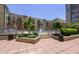A paved walkway leads to a fenced pool area surrounded by trees and shrubbery at 711 Cosmopolitan Ne Dr # 338, Atlanta, GA 30324